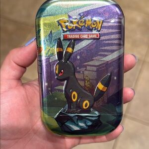 Pokemon Prismatic Mini tin sealed packs inside!